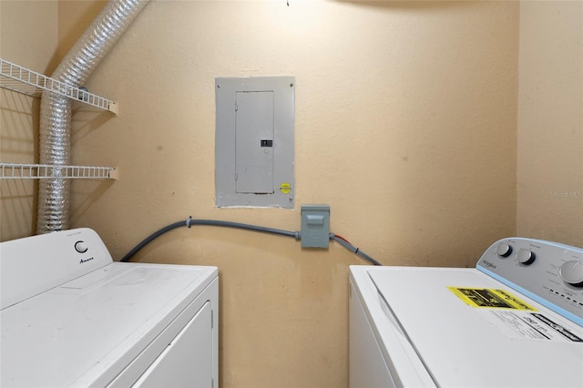 laundry area featuring electric panel and independent washer and dryer