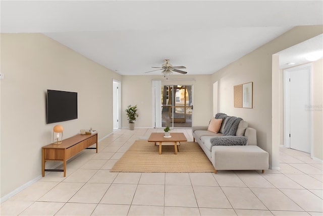 tiled living room with ceiling fan