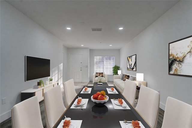 dining area featuring hardwood / wood-style flooring