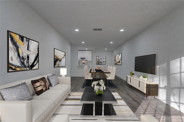 living room featuring dark hardwood / wood-style floors