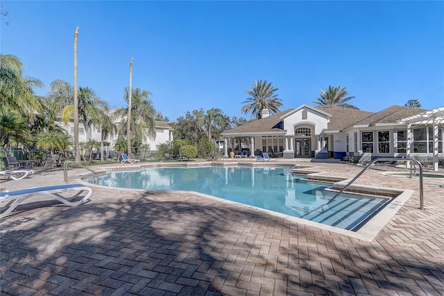 view of swimming pool featuring a patio