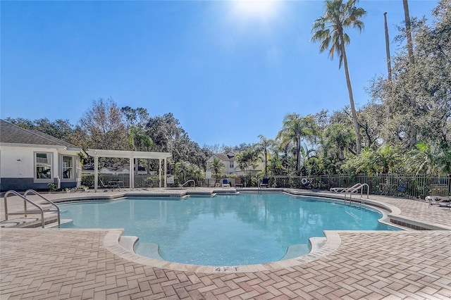 view of swimming pool with a patio area