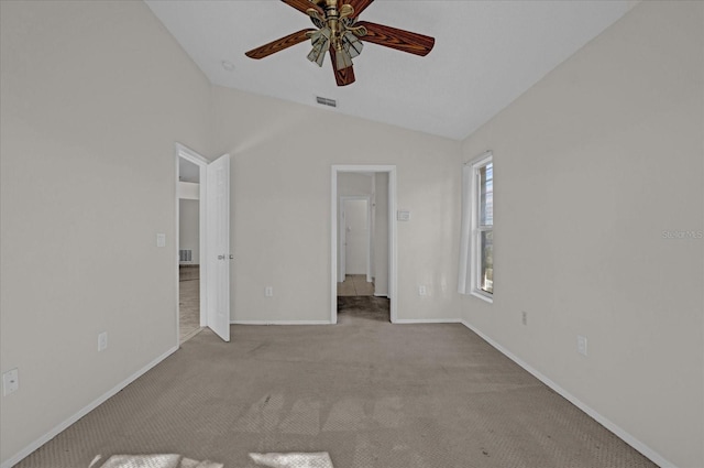 interior space featuring ceiling fan and vaulted ceiling