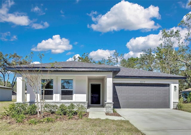 view of front of property with a garage