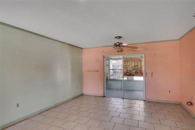 spare room with crown molding, ceiling fan, and a textured ceiling