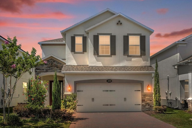 view of front of home with a garage