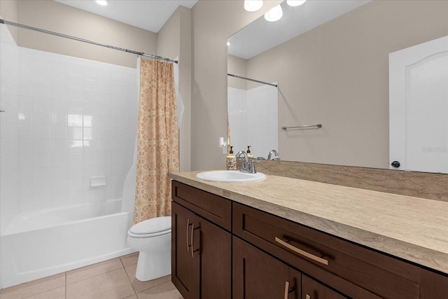 full bathroom featuring tile patterned flooring, vanity, toilet, and shower / tub combo with curtain