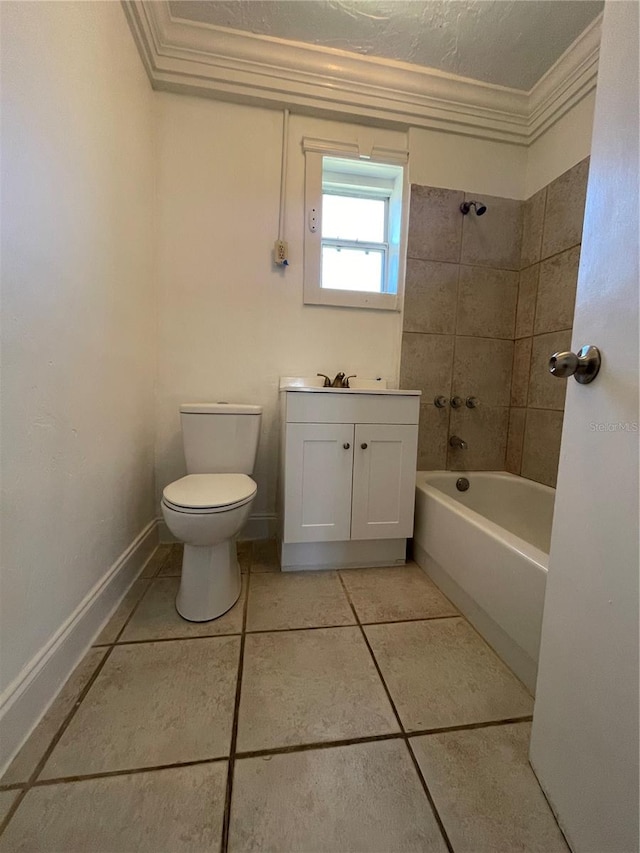 full bathroom with tiled shower / bath combo, tile patterned floors, a textured ceiling, toilet, and ornamental molding