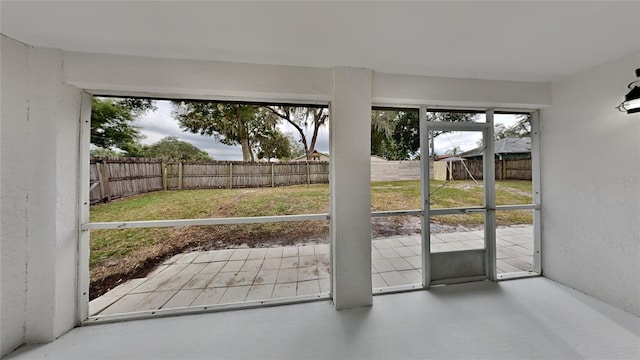 doorway with concrete floors