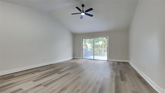 unfurnished room featuring ceiling fan, light hardwood / wood-style flooring, and vaulted ceiling