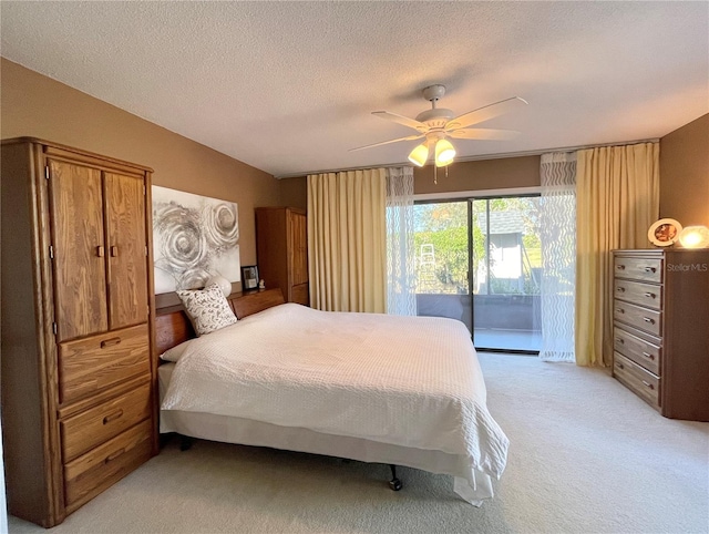 bedroom with light carpet, a textured ceiling, access to outside, and ceiling fan