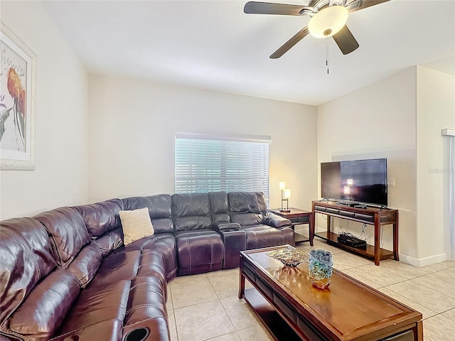 living room featuring ceiling fan and light tile patterned floors