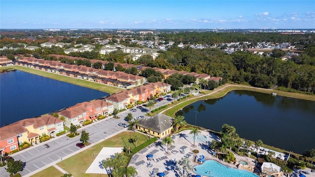 bird's eye view with a water view