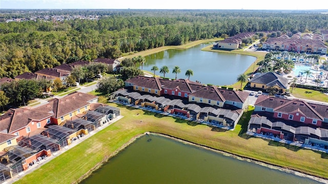 drone / aerial view with a water view