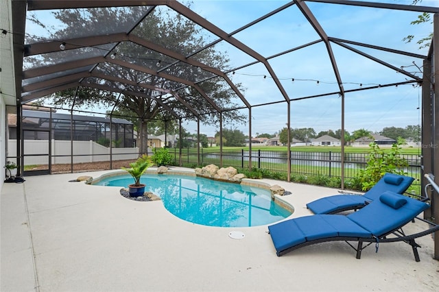 view of swimming pool featuring a patio, a water view, and a lanai