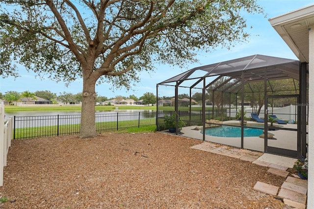 exterior space featuring a water view and a lanai