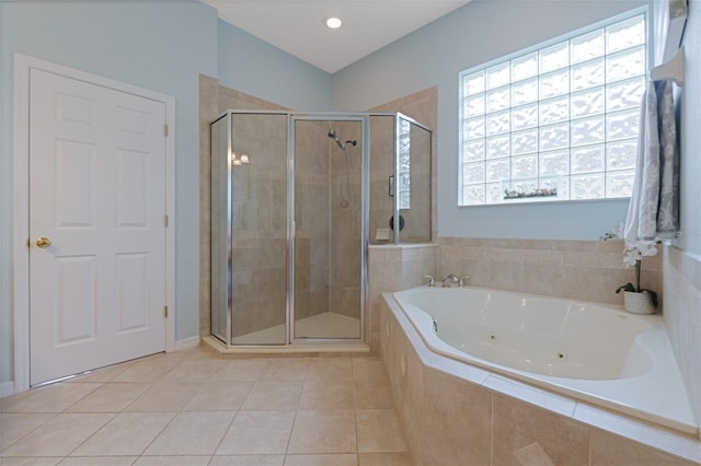 bathroom with tile patterned floors and independent shower and bath