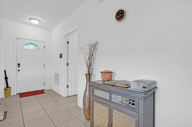 view of tiled foyer entrance