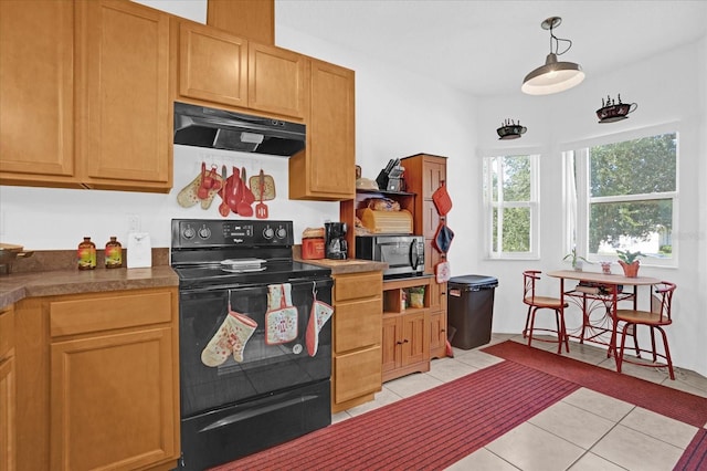 kitchen with light tile patterned flooring, black range with electric stovetop, hanging light fixtures, and exhaust hood