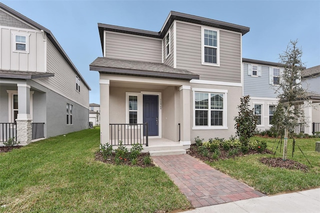 view of front of house with a front lawn