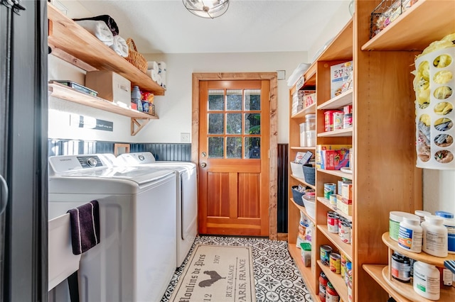 laundry room featuring separate washer and dryer