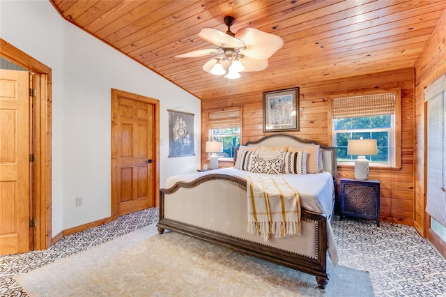 carpeted bedroom with wooden walls, ceiling fan, lofted ceiling, and wood ceiling