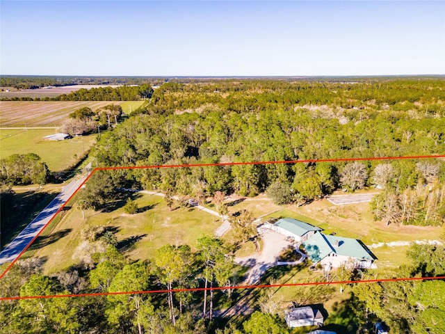 birds eye view of property featuring a rural view