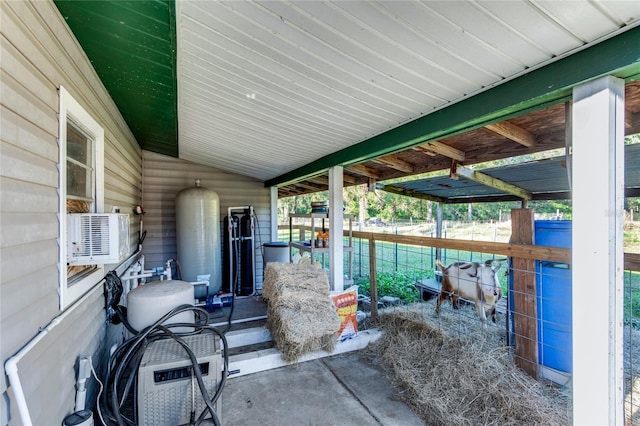 view of patio featuring an outbuilding