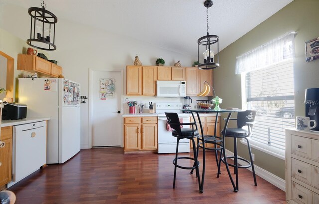 kitchen featuring dark hardwood / wood-style floors, vaulted ceiling, decorative light fixtures, white appliances, and light brown cabinetry