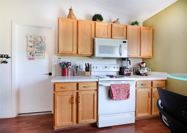 kitchen with white appliances, a textured ceiling, light brown cabinets, dark hardwood / wood-style floors, and lofted ceiling