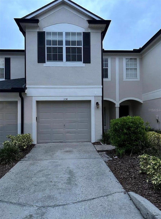 front of property featuring a garage