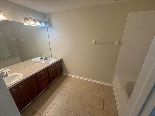 bathroom with tile patterned flooring and vanity