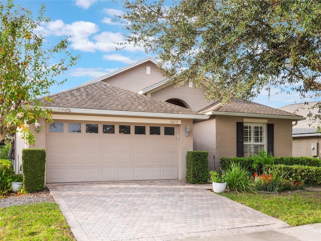 view of front of home with a garage