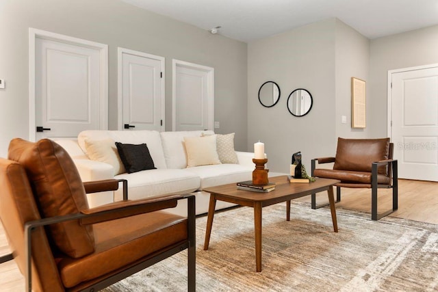 205 E 17th St, Apopka, FL 32703 - living area with light wood-type flooring