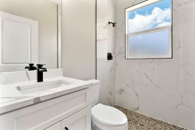 205 E 17th St, Apopka, FL 32703 - full bath featuring vanity, a marble finish shower, and toilet