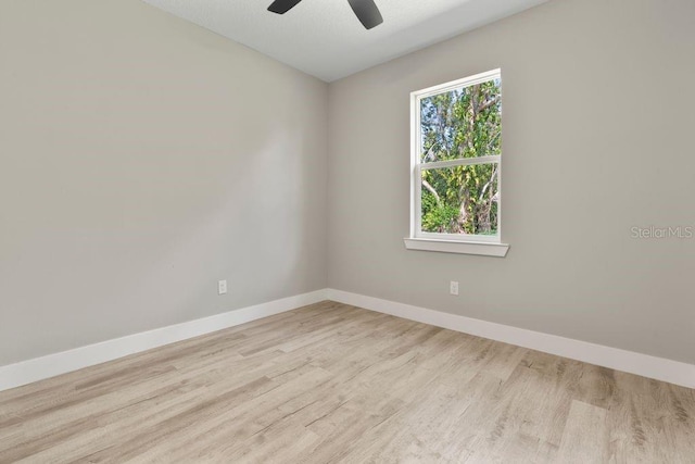 205 E 17th St, Apopka, FL 32703 - unfurnished room featuring baseboards, a ceiling fan, and wood finished floors