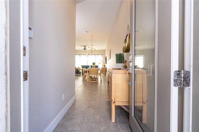 corridor featuring tile patterned floors