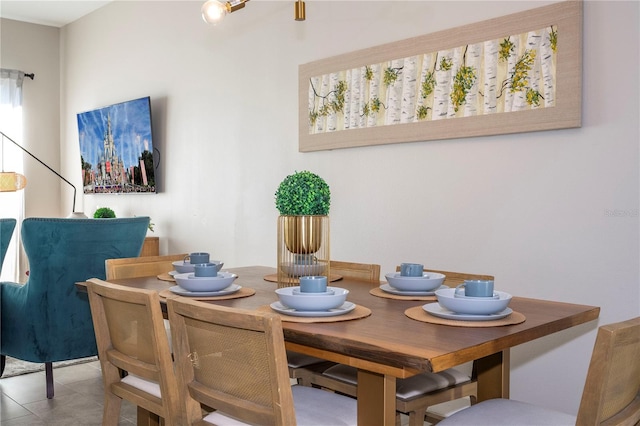 tiled dining space with plenty of natural light