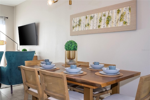 tiled dining area with plenty of natural light