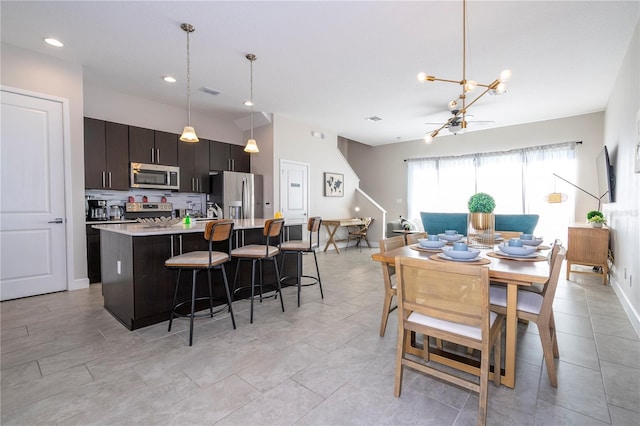 172 Villa Domani Cir, Davenport, FL 33896 - dining space featuring a chandelier and recessed lighting