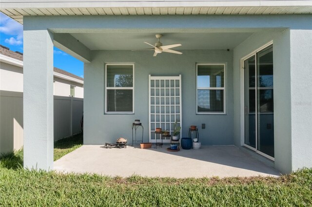 view of patio with ceiling fan