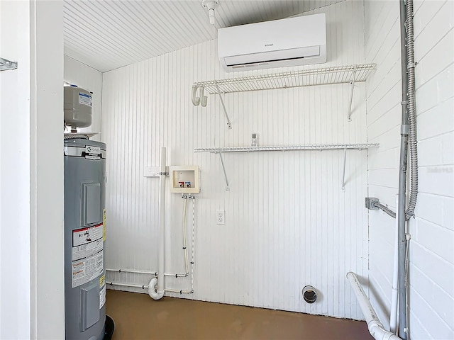 laundry area with electric dryer hookup, electric water heater, wooden walls, washer hookup, and a wall unit AC