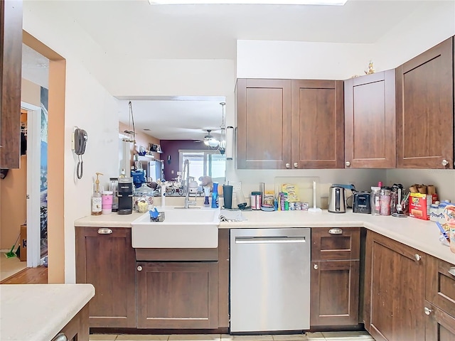 kitchen featuring stainless steel dishwasher, ceiling fan, and sink