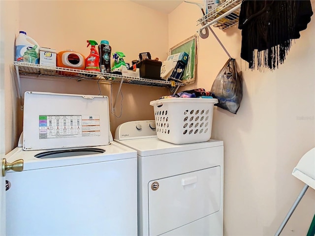 laundry area featuring washing machine and dryer