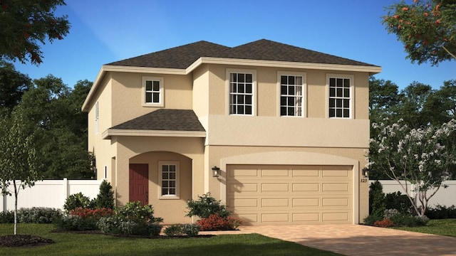 view of front of property featuring a garage