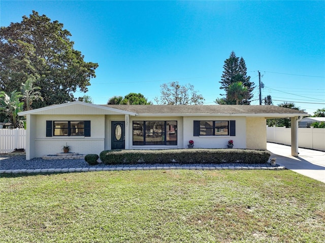 ranch-style home with a front yard