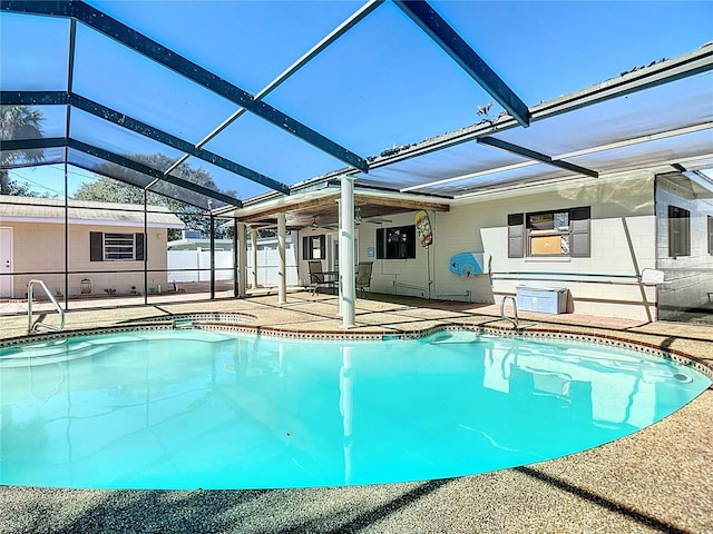 1037 Poinsetta St, Cocoa, FL 32927 - outdoor pool with a patio area, an in-ground hot tub, a lanai, and a ceiling fan
