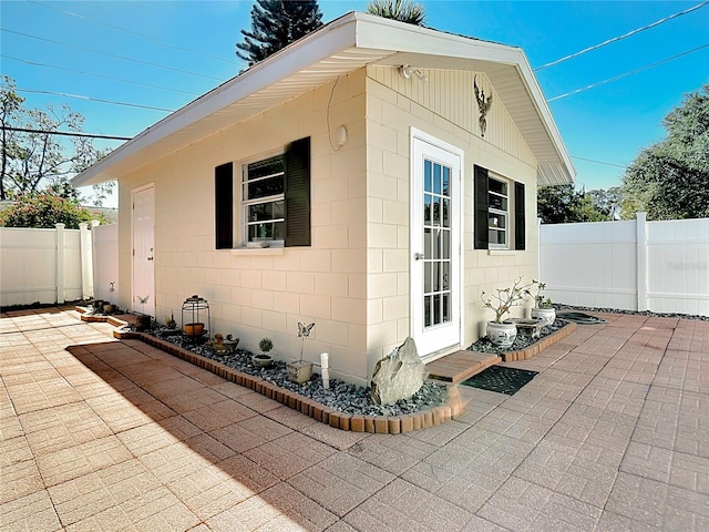 view of home's exterior featuring a patio area