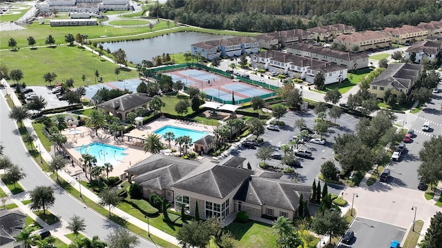 drone / aerial view with a water view