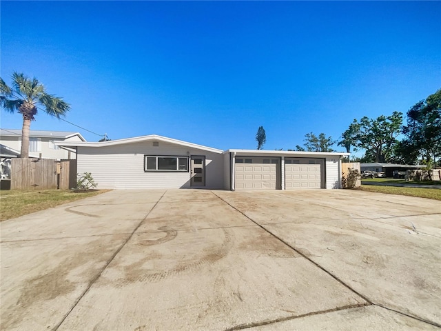 single story home with a garage